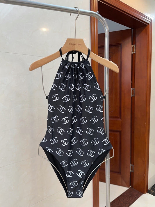 All over logo print halterneck swimsuit