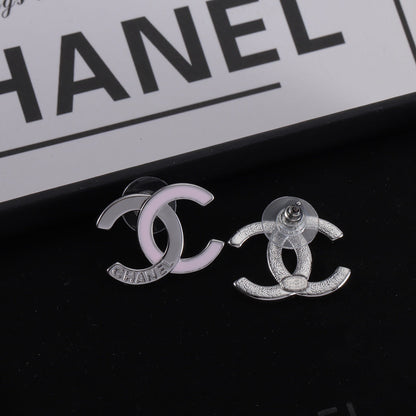 New two-tone logo engraved earrings